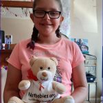 NAIT baby Neve raises awareness with the 1st Aylestone Brownies in Leicester, UK.
